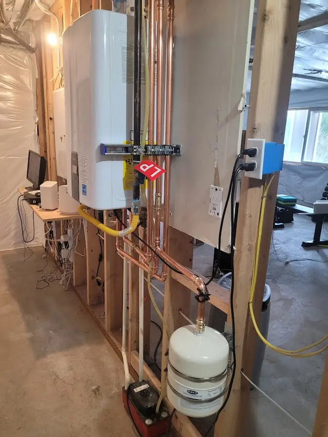 Licensed plumber repairing a kitchen sink in Hanover