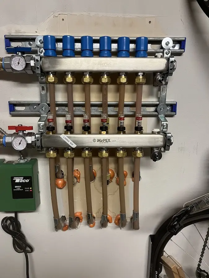 Plumber performing Water Heater Repair at a residential property in Hanover